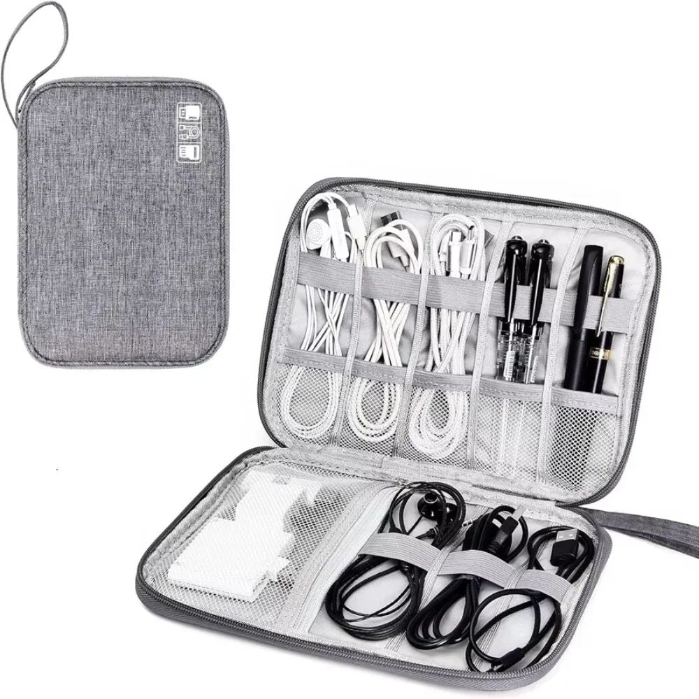 Gray travel organizer with compartments for electronic accessories on a white background